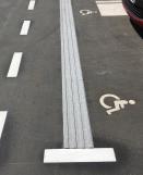 MILAN Granit Rippenplatte auf Behindertenparkplatz