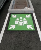 Symbole point de rassemblement blanc et vert pour marquage au sol