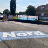 Application de POLYKOLOR  pour l'épreuve cycliste du grand prix de Denain porte du Hainaut - Denain (59)